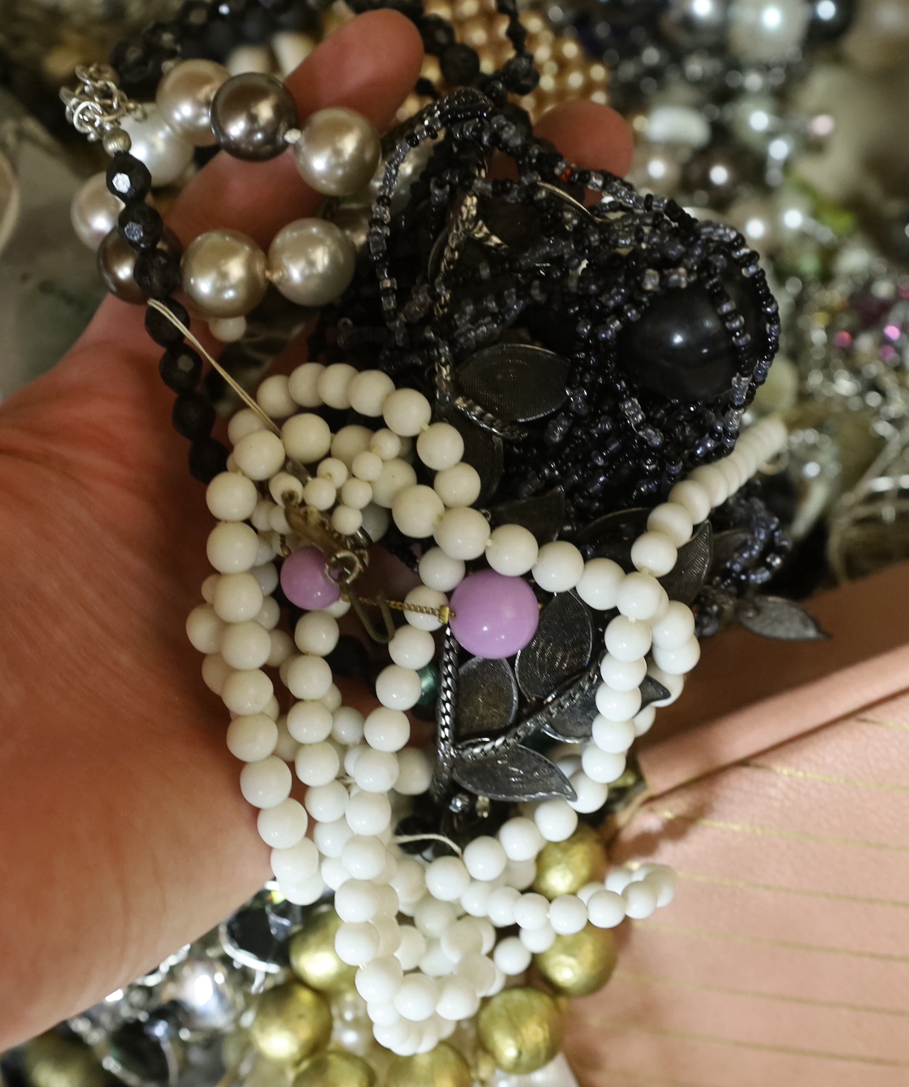 A large quantity of assorted mainly modern costume jewellery.